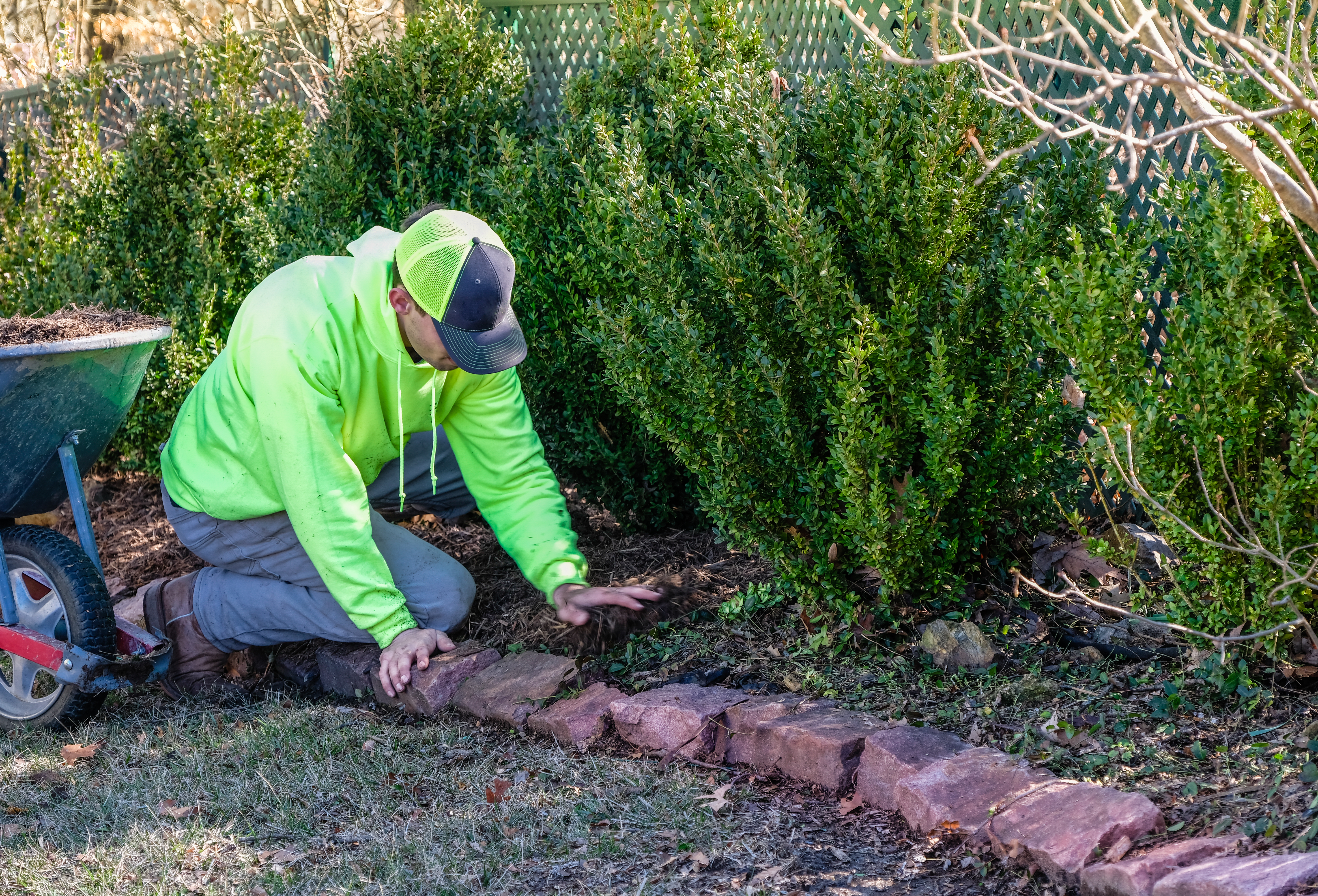 man installing new pavers